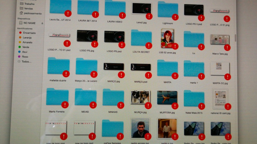 red exclamation mark in Finder folders